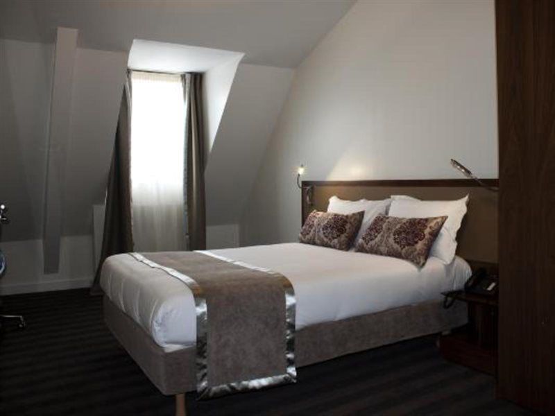 Art Hotel Congres Paris Quarto foto